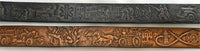 A side-by-side view of the Firefighter History scene tooled pattern on two colors of leather: a black/grey distressed finish (top) and the two-tone brown finish (bottom).